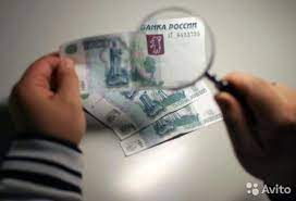 Полицейские Брюховецкого района информируют о признаках поддельных денежных купюр
