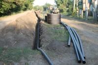В Брюховецком поселении ремонтируют дороги, строят тротуары, реконструируют водопроводные сети